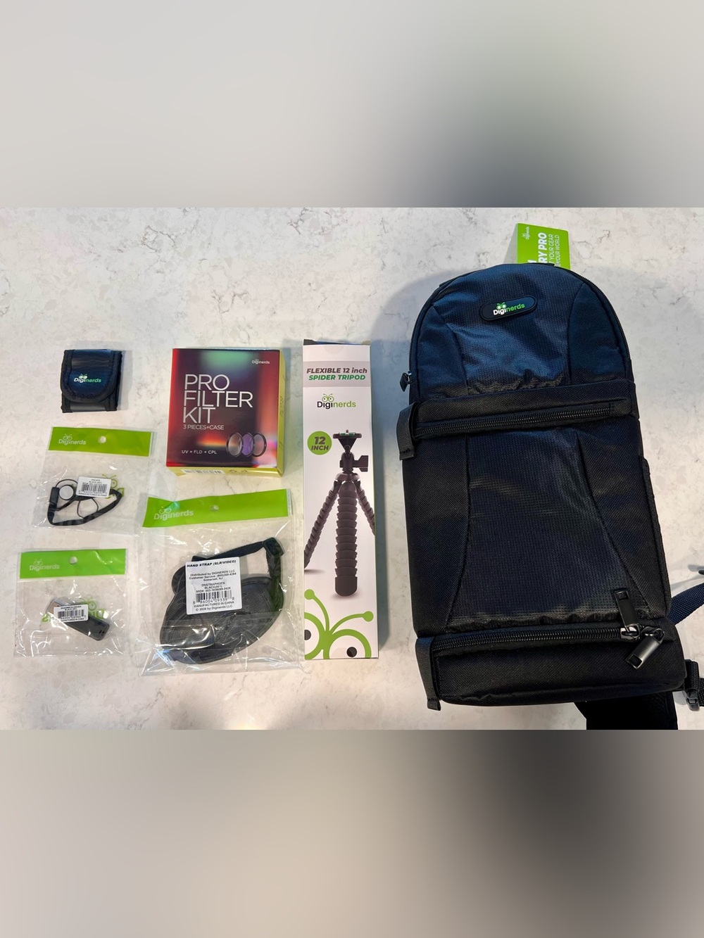 Diginerds pack - sling bag, tripod, filters, straps, usb stick, card holder